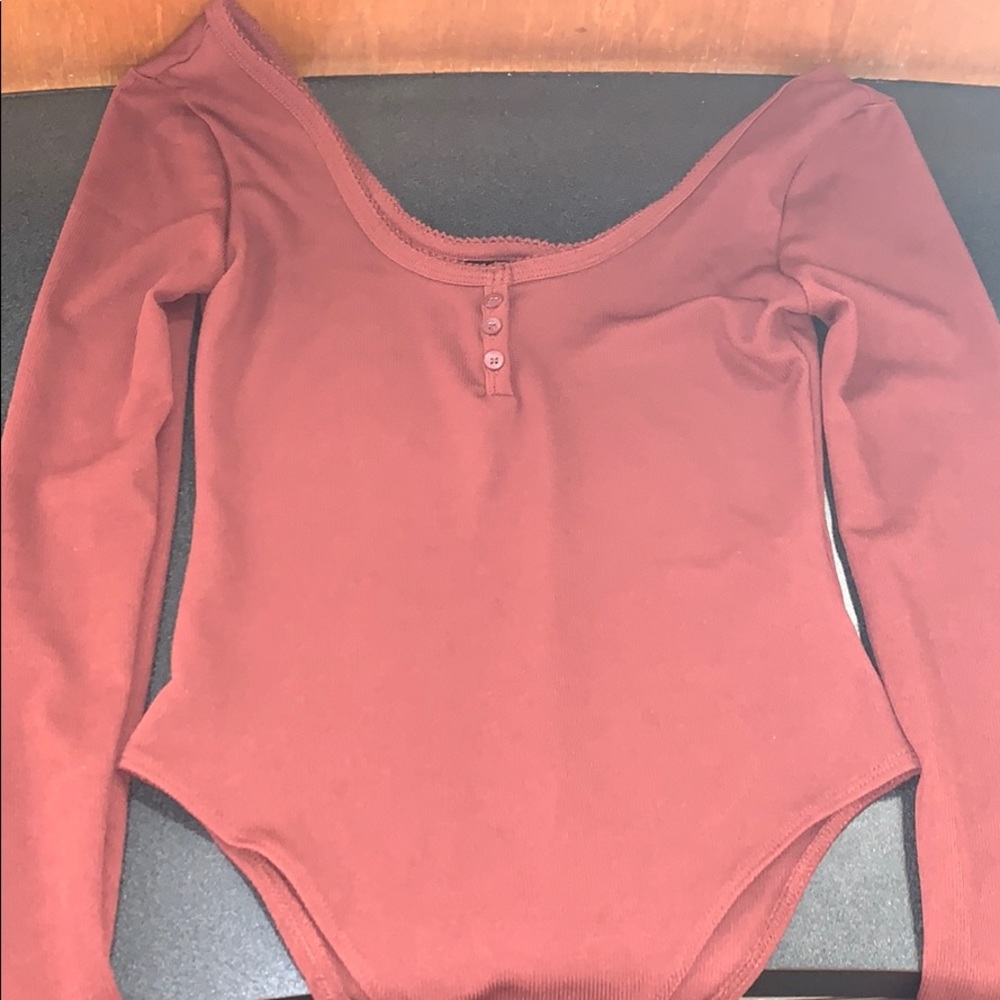 Scoop cut long sleeve body suit